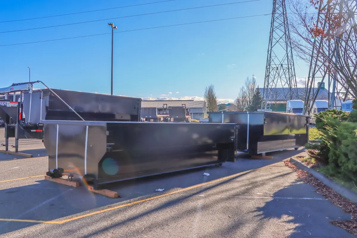 Roll-off dumpster ready for waste disposal at job site for 3 Yard Dumpster Rental in Pittsfield